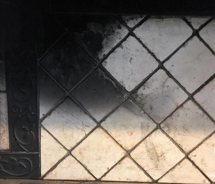 Kitchen backsplash prior to cleaning after cooking fire