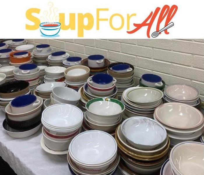 Table filled with stacked soup bowls