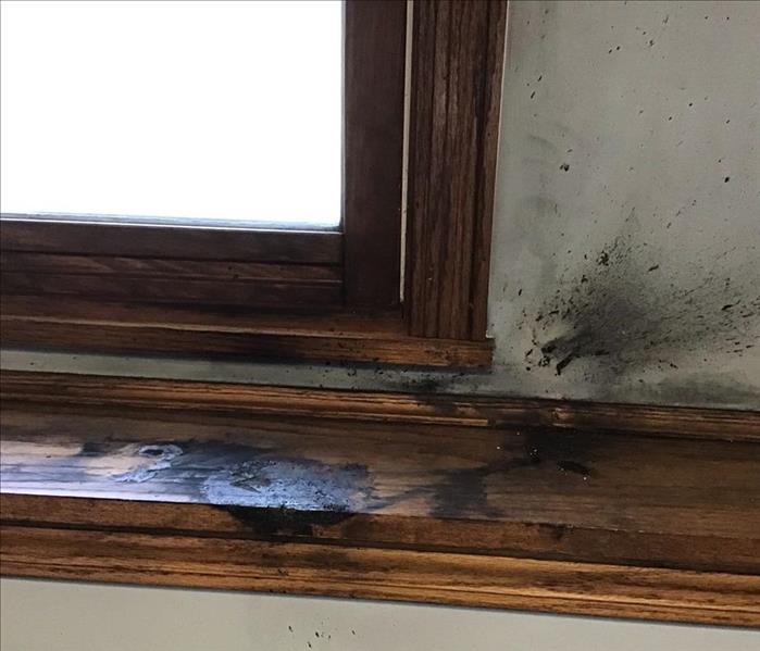 Windowsill and wall burned from exploding portable power bank